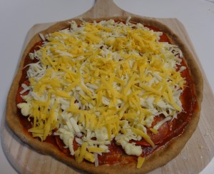 Pepperoni pizza on peel